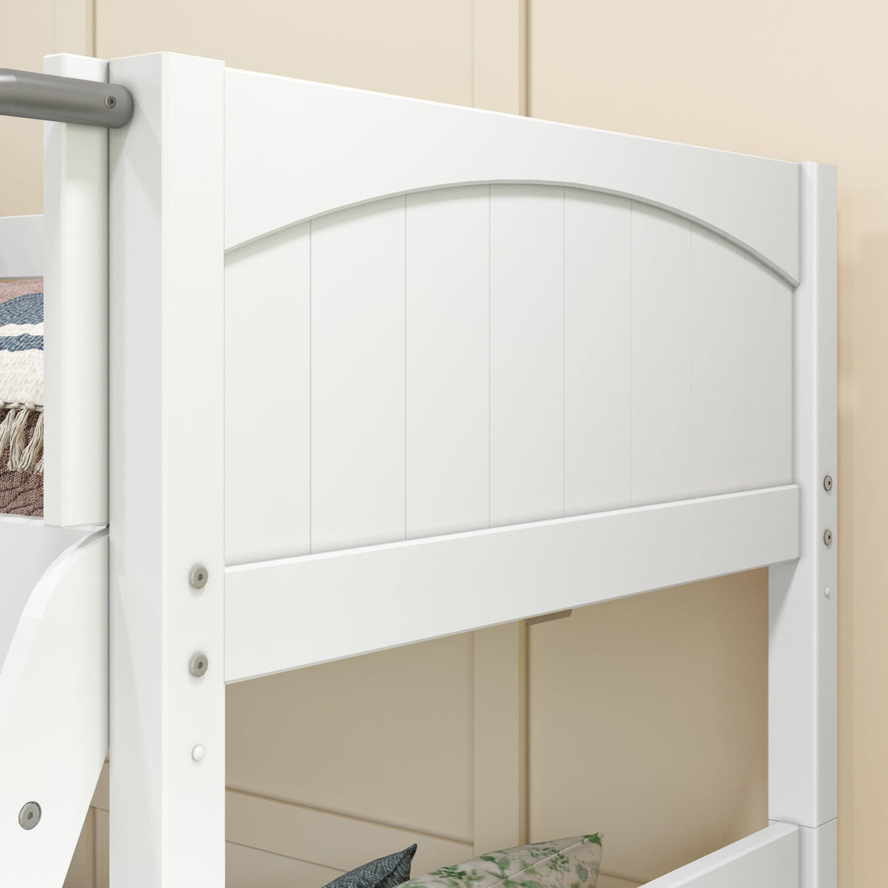 White wooden bunk bed corner with smooth finish and beige wall background.