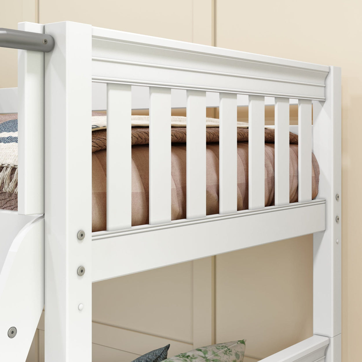 White wooden bunk bed with safety rails and beige bedding in a bedroom.