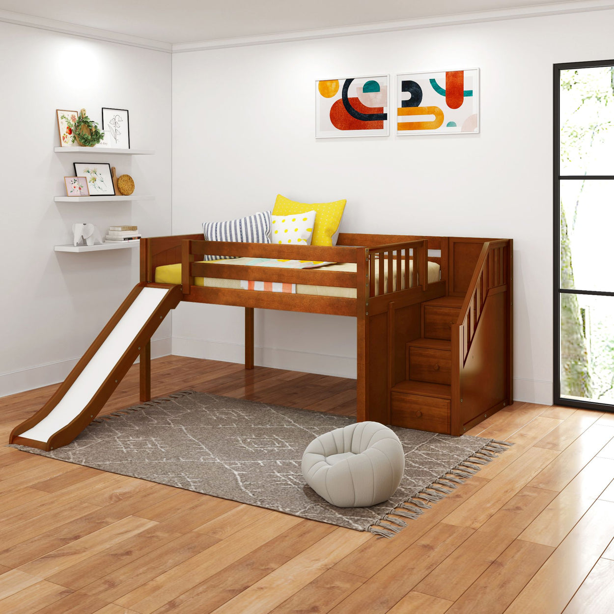 Wooden loft bed with slide and stairs in a modern, well-lit children's bedroom featuring playful decor and colorful pillows.