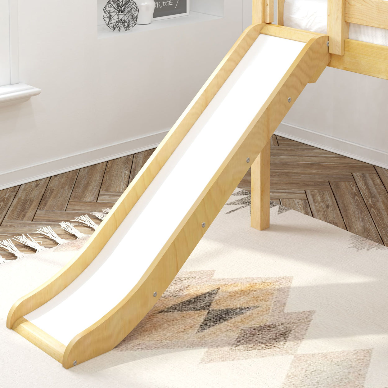 Kids playroom with wooden slide attached to loft bed on patterned rug.