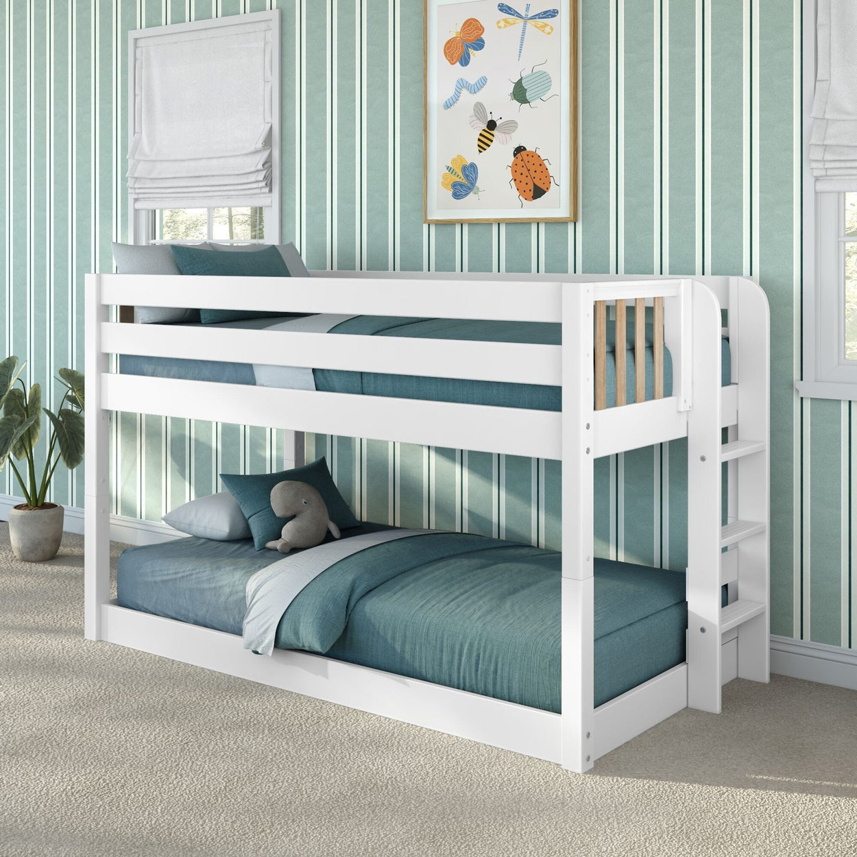 White wooden twin bunk bed with teal bedding and built-in ladder in a kids' bedroom with green striped wallpaper and stuffed toy