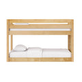 Solid natural wood bunk bed with upper guardrail and white bedding, space-saving kids' bedroom loft in maple finish