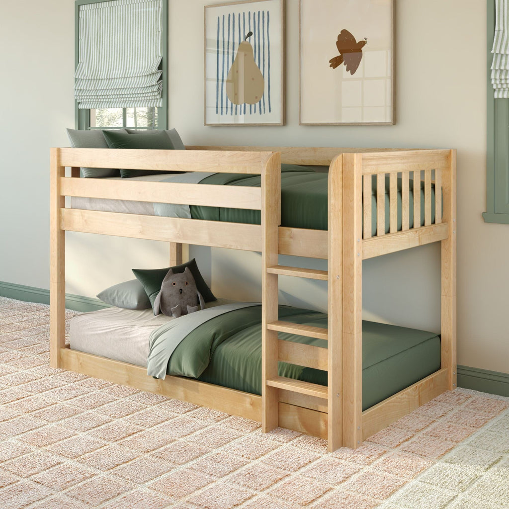 Natural light wood twin-over-twin bunk bed with built-in ladder and guardrails in a green-themed kids bedroom, green bedding and plush owl toy