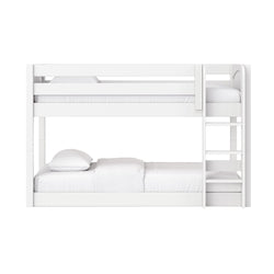 White wooden twin-over-full bunk bed with ladder, crisp white mattresses and pillows, modern minimalist kids' bedroom furniture