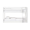 White wooden bunk bed with ladder and guardrails, minimalist modern kids' bedroom furniture with white mattresses and pillows