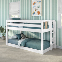 White twin-over-twin wooden bunk bed with built-in ladder and guardrails, teal bedding and plush toy in a children's bedroom with green striped wallpaper, potted plant and framed insect art