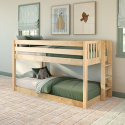 Natural wood twin-over-twin bunk bed with ladder in children's bedroom, green bedding, plush toy, framed wall art and striped roman shades