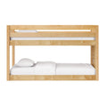 Light natural wood bunk bed with white bedding, top guardrail and slatted frame — modern solid wood twin-over-twin kids' bunk bed