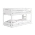 White wooden twin-over-full bunk bed with upper guardrail and ladder, solid wood frame and white bedding — modern space-saving kids' bedroom furniture