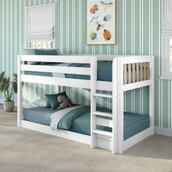 White wooden bunk bed with teal bedding and ladder in kids' room with striped wallpaper, plush elephant toy and insect art