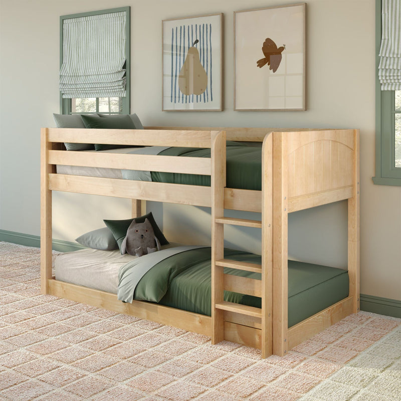 Natural wood twin loft bunk bed in a children's bedroom with green bedding, plush toy, striped Roman shades and framed pear and bird wall art
