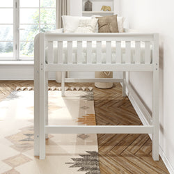 White wooden loft bed with decorative pillows in a bright children's room with geometric-patterned rug and large window.