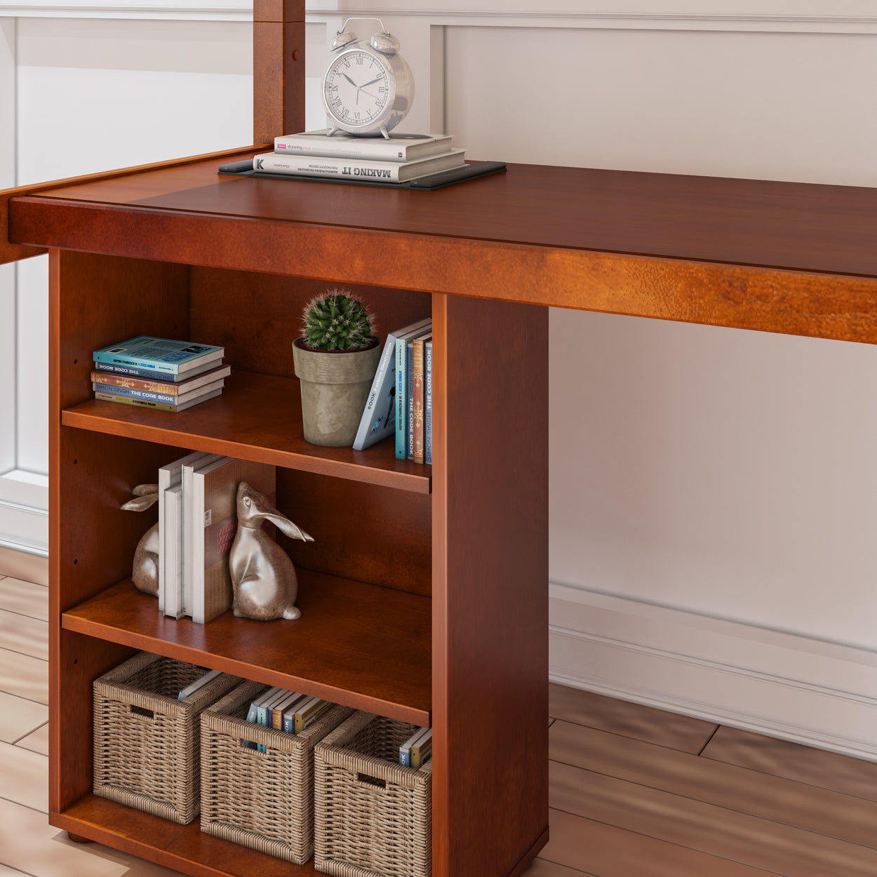 Modern wooden desk with integrated bookshelves, featuring a clock, books, a potted cactus, rabbit figurines, and wicker baskets for organized home office storage.
