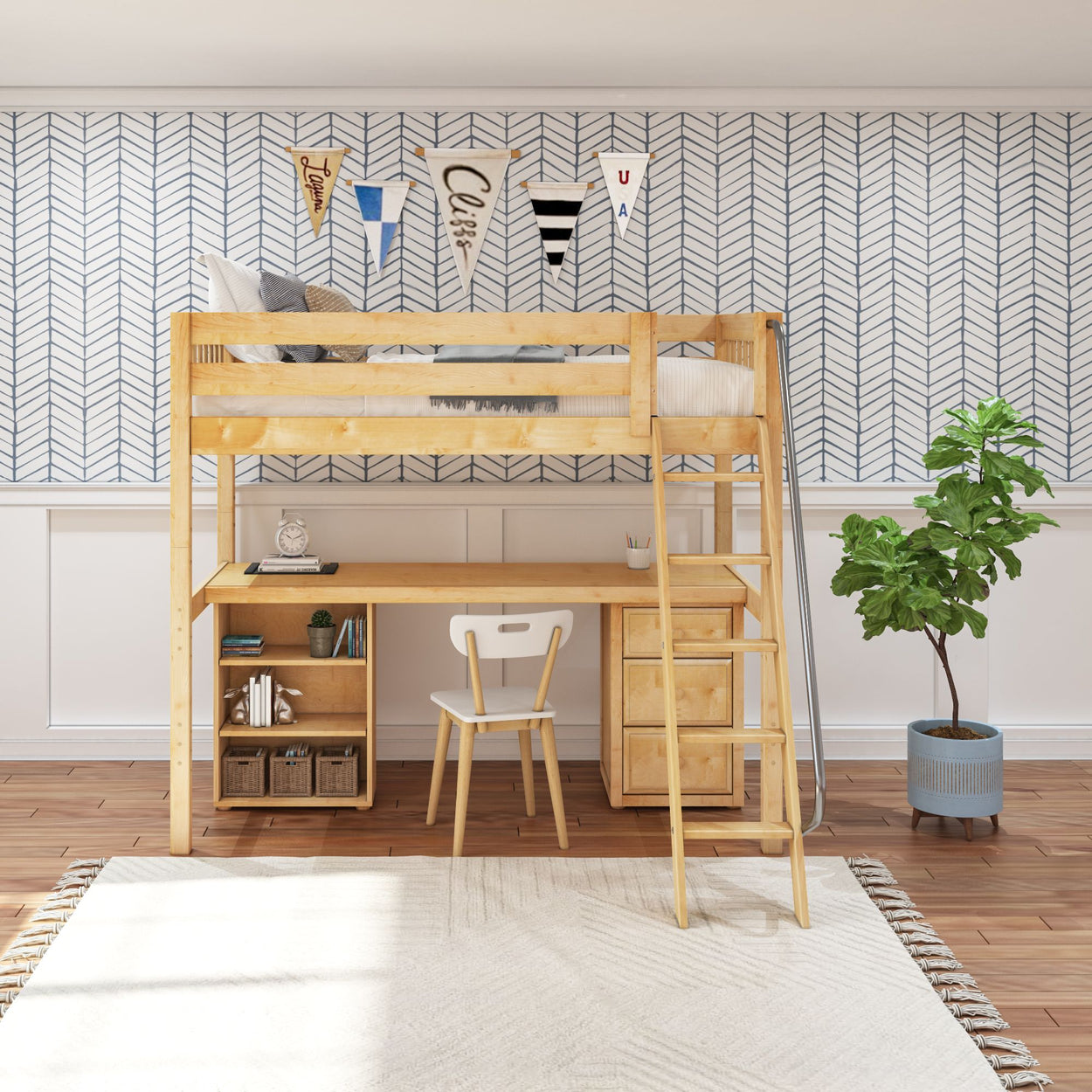 Wooden loft bed with ladder and integrated desk in modern kids' room with patterned wallpaper and indoor plant.