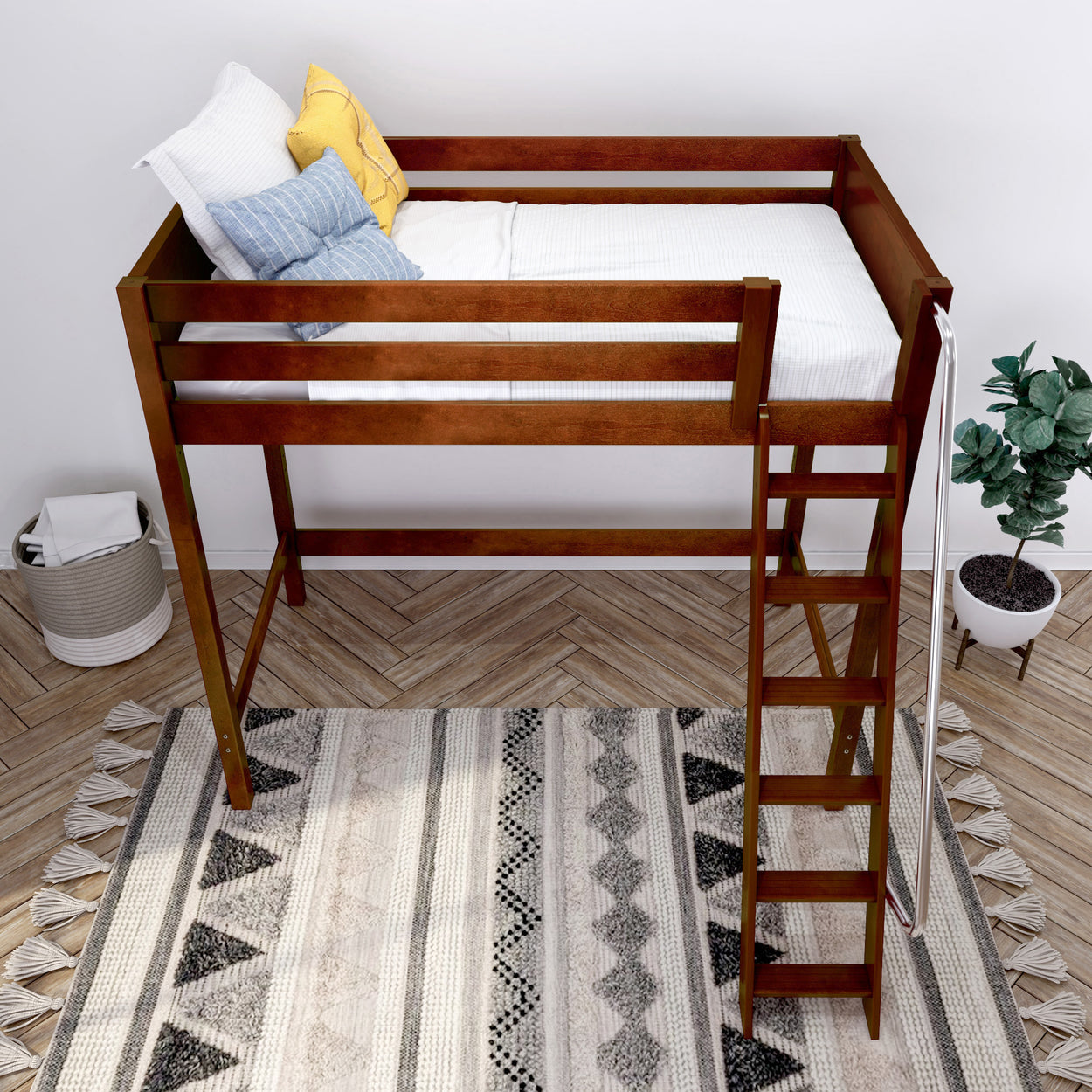 Wooden loft bed with ladder in modern bedroom featuring a patterned rug and indoor plant.