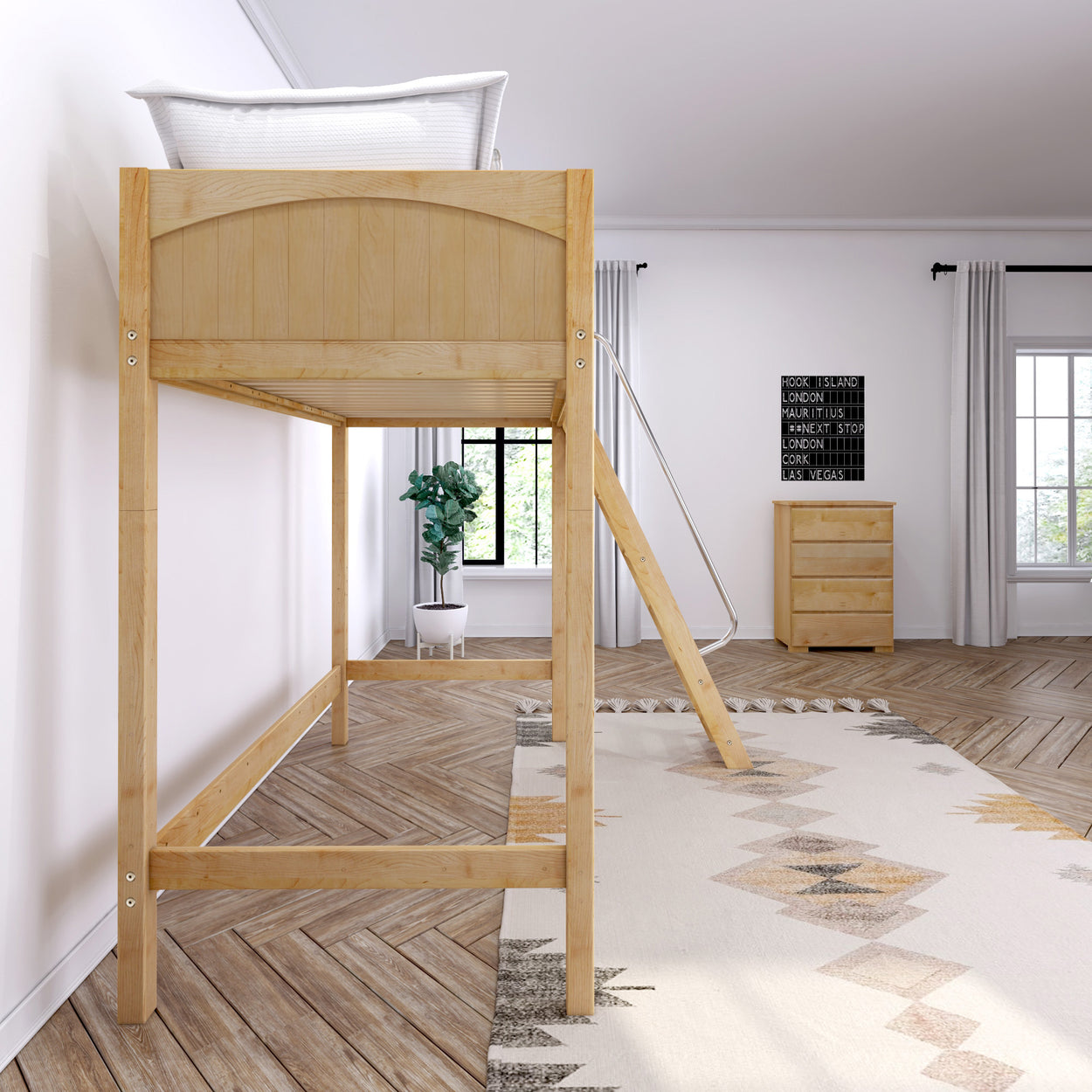 Loft bed with ladder in modern bedroom interior featuring wooden furniture and white curtains.