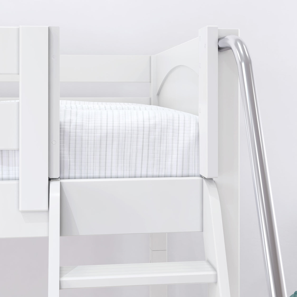 White loft bed with a striped mattress and metal slide in a children's bedroom.
