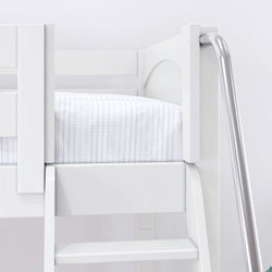 White loft bed with a striped mattress and metal slide in a children's bedroom.
