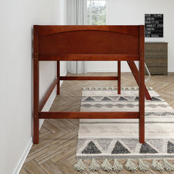 Wooden loft bed frame in cozy bedroom with chevron patterned rug.