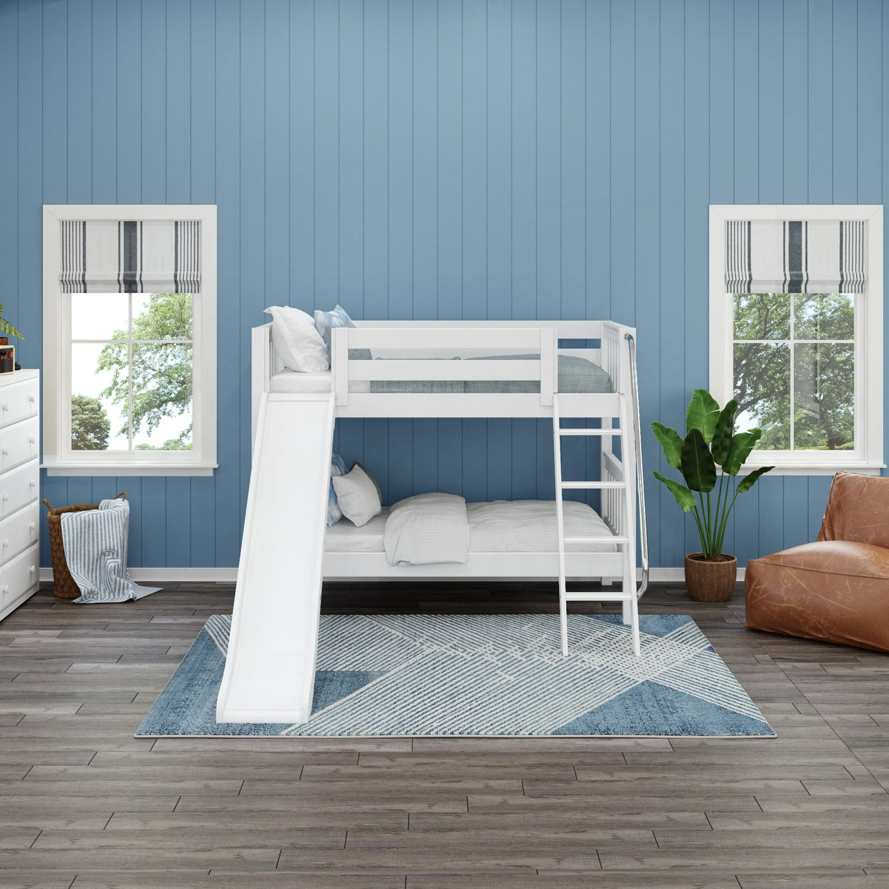 White bunk bed with slide in a modern blue kids' room featuring striped carpet and wooden floors.