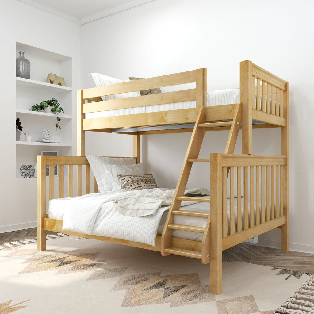 Natural wood twin bunk bed with ladder in bright modern kids' bedroom, white bedding, patterned pillows and built-in shelves with plant and decor