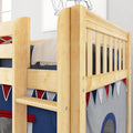 Close-up of solid wood bunk bed with natural maple finish, safety guardrail and ladder, navy and red kids bedding and chunky knit blanket