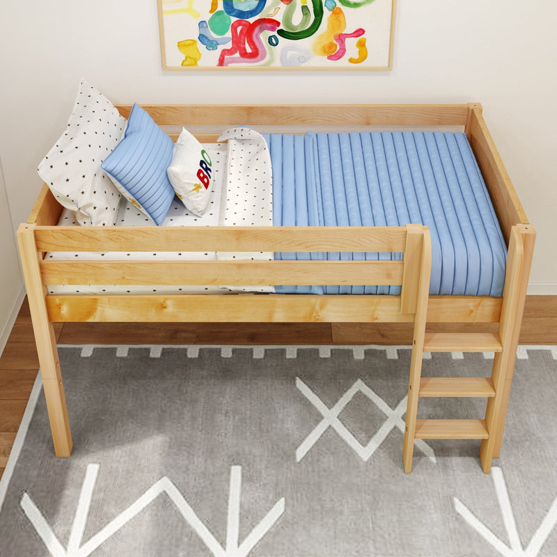 Wooden kids loft bed with light blue quilted mattress, star-print sheets and pillows, ladder, colorful abstract wall art and gray geometric rug