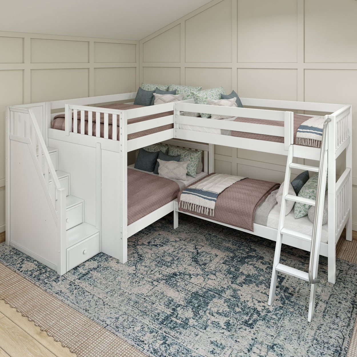 White L-shaped bunk bed with built-in storage stairs and ladder, featuring cozy bedding in a stylish kids' bedroom setting.