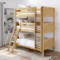 Natural wood triple bunk bed with ladder in modern kids' bedroom, white bedding, neutral pillows and boho rug
