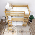 Natural wood bunk bed with white bedding, neutral pillows, ladder and boho rug in Scandinavian kids' bedroom with potted plant