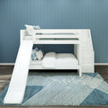 White bunk bed loft with slide and stair storage in modern kids' bedroom, blue paneled wall, cozy bedding and geometric rug