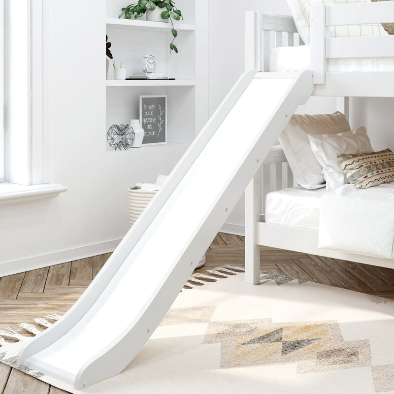 White loft bunk bed with slide in a bright Scandinavian kids' bedroom, built-in white shelves with clock and decor, boho patterned pillows, woven basket and neutral rug on wood floors