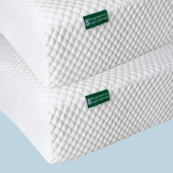 Close-up of an 8‑inch gel memory foam mattress with white textured quilted cover and breathable cooling surface