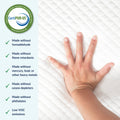 CertiPUR‑US certified mattress foam badge with hand pressing white quilted mattress surface, eco-friendly mattress foam made without formaldehyde, flame retardants, heavy metals or phthalates and low VOC emissions