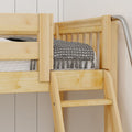 Close-up of natural pine wooden bunk bed ladder and side rail with gray patterned throw and mattress in kids' bedroom