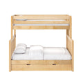 Light wood twin-over-twin bunk bed with guardrails, white bedding and pillows, and built-in under-bed storage drawers on a white background