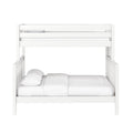 White wooden loft bunk bed frame with upper guardrails and full-size lower bed dressed in white bedding — modern kids' bed