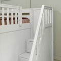 White wooden loft bunk bed close-up showing built-in storage stairs, slatted safety rails and brown bedding against pale green wall — modern kids bedroom furniture