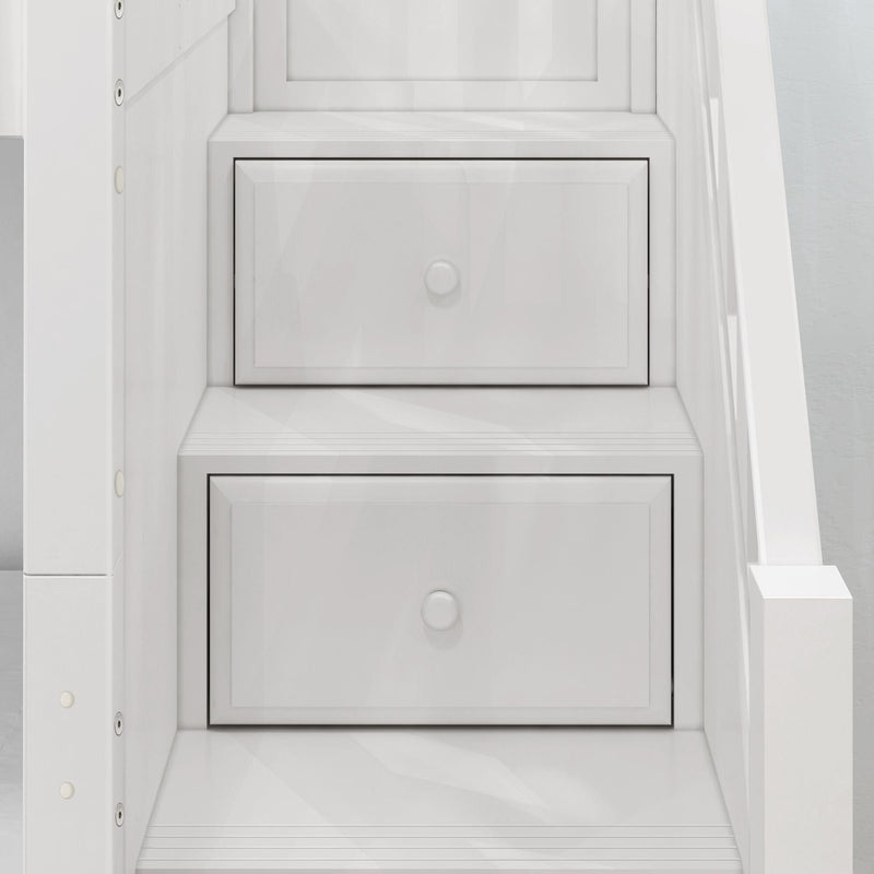 Close-up of white custom built-in under-stair storage drawers with shaker-style panel fronts and round knobs
