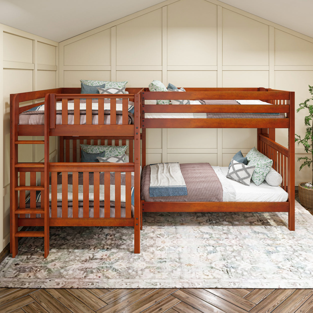 Four-person wooden bunk bed with decorative pillows in a cozy room setting.