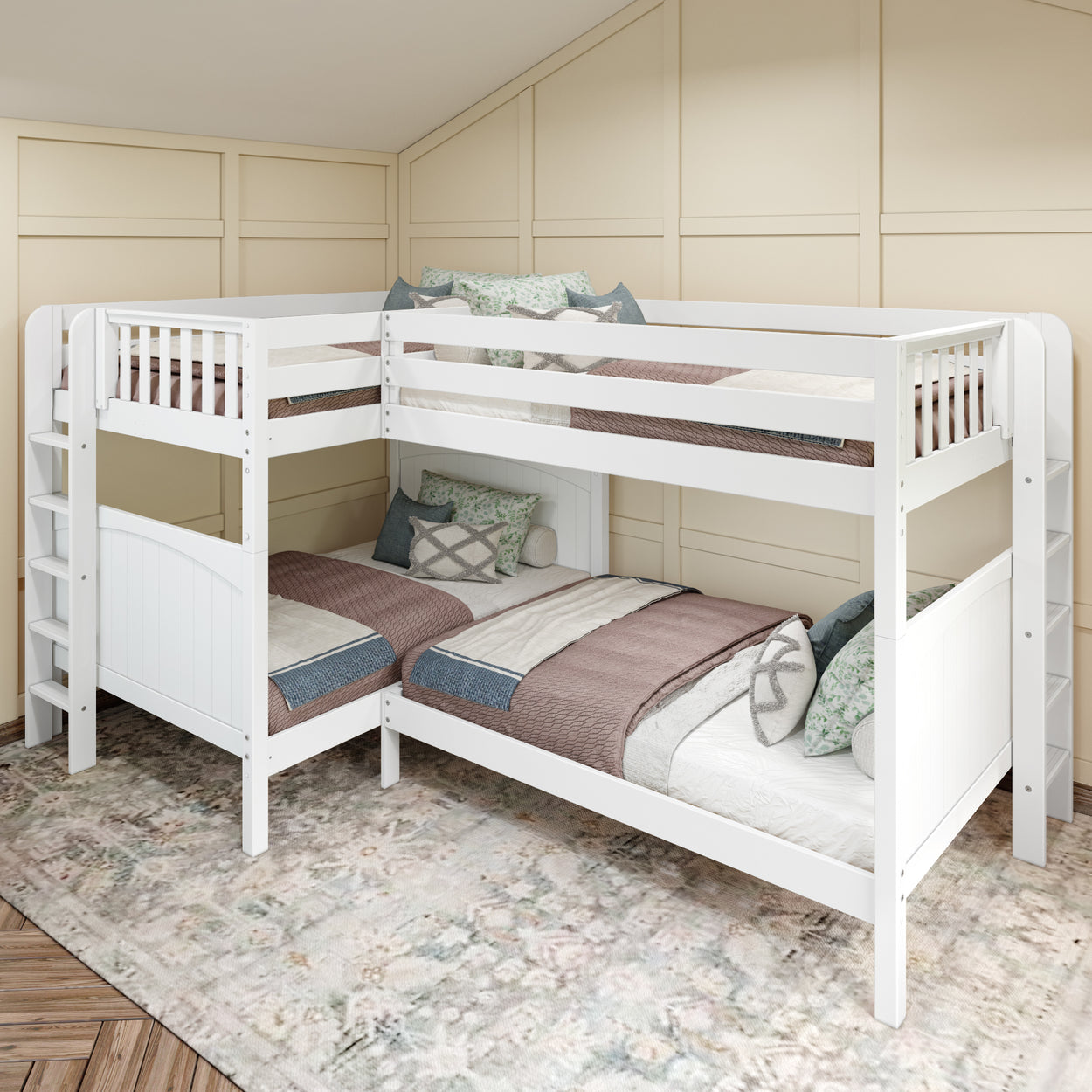 L-shaped white bunk bed with bedding in neutral colors, placed in a cozy attic room with a wooden floor and panel walls.