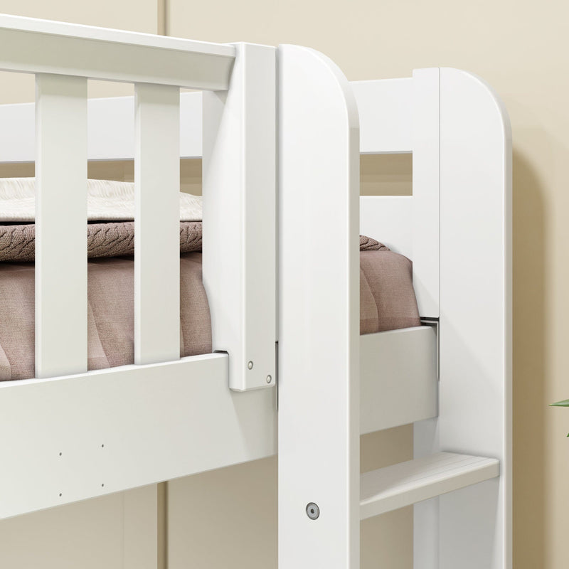 Close-up of white wooden crib and bunk bed safety rail with ladder step and beige bedding in a modern nursery