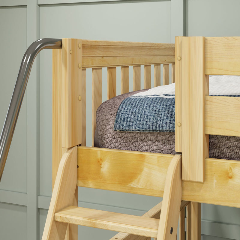 Natural pine wooden bunk bed ladder and safety rail with blue knit blanket against light green paneled wall