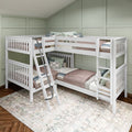 White L-shaped wooden bunk bed with ladder in a sage green paneled kids' bedroom, featuring cozy blush quilts, patterned pillows and a neutral area rug, space-saving twin loft bed