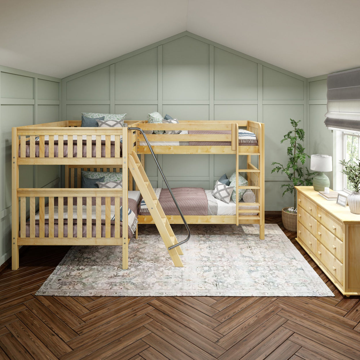 Wooden bunk bed in a cozy bedroom with pastel green walls, featuring a light wood dresser and decorative plants.