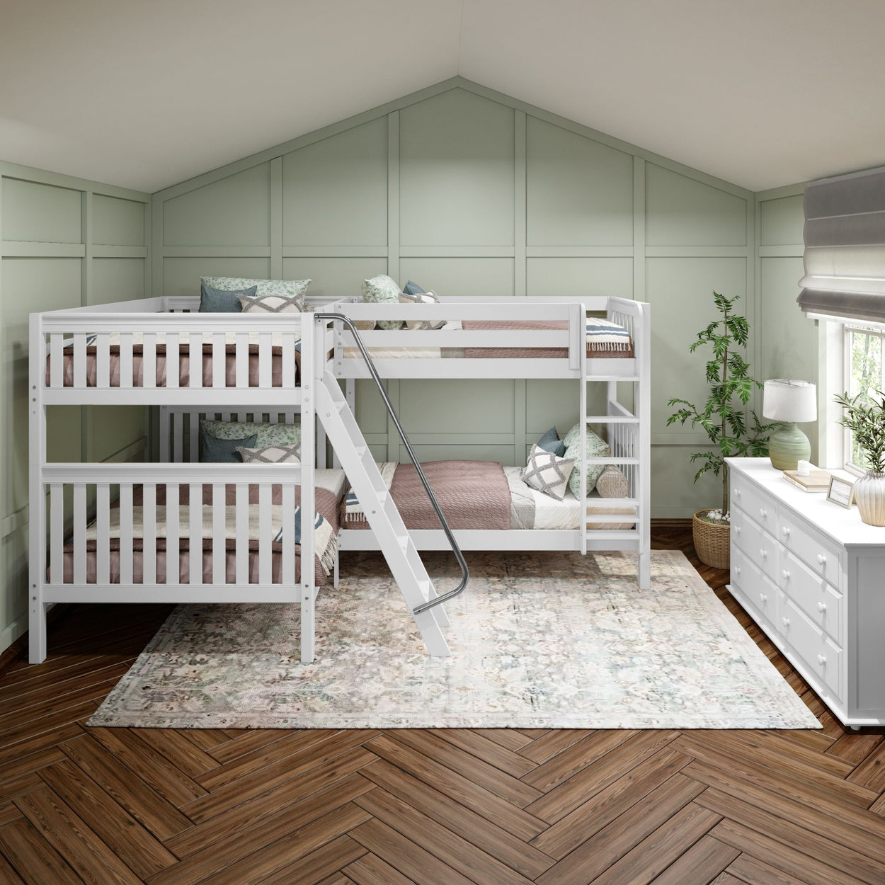 Three-tier white bunk bed in modern bedroom with green walls and wooden flooring.