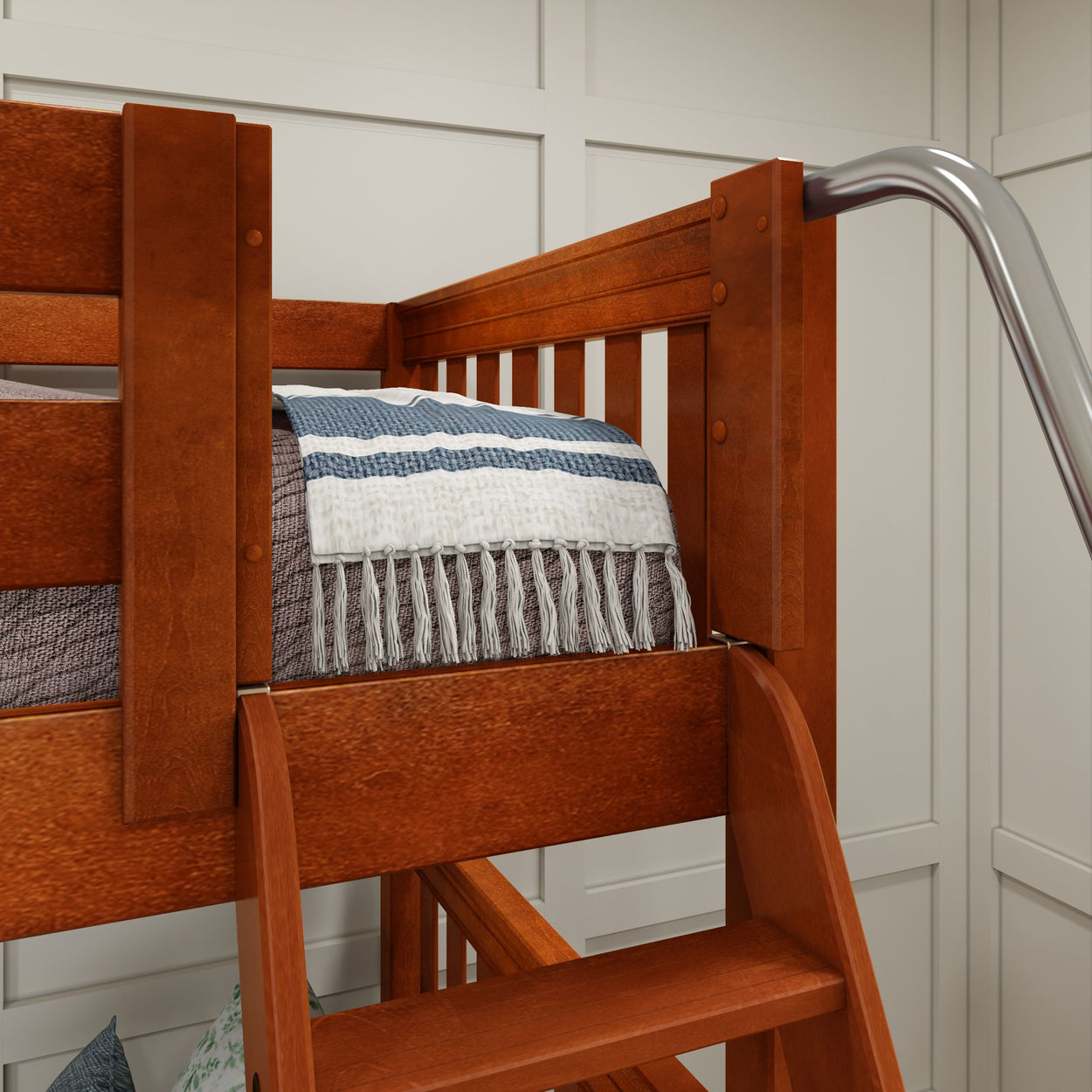 Wooden bunk bed with blue and white striped blanket in cozy bedroom.