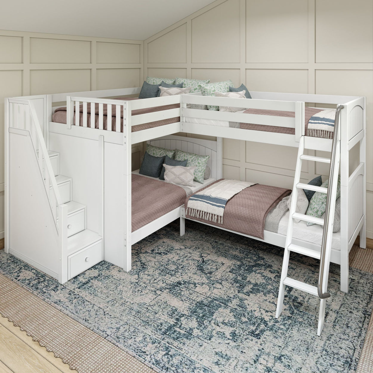 White corner bunk bed with storage stairs and ladder in a modern bedroom setting on blue patterned rug.