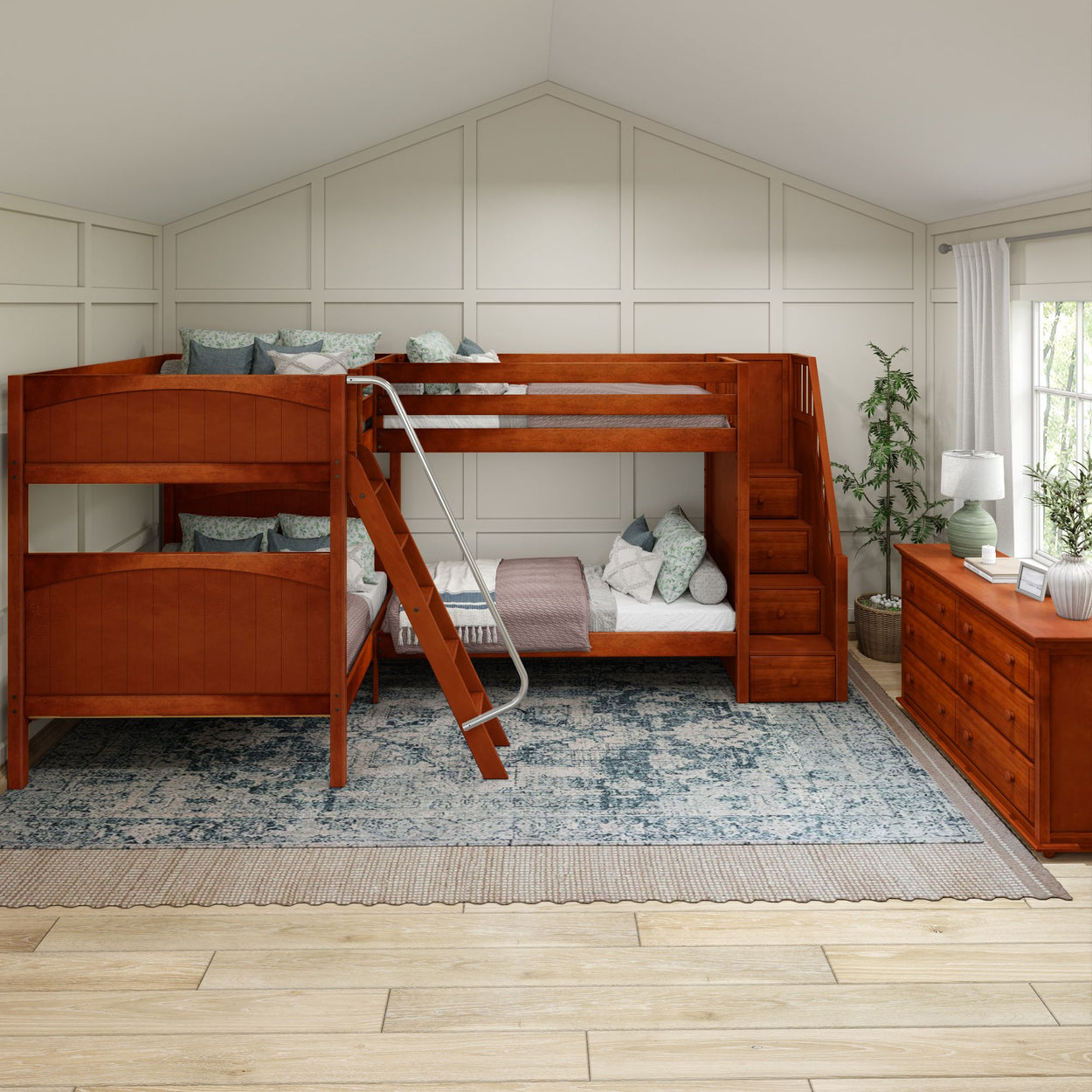 Stylish wooden bunk bed with stairs in a modern bedroom, featuring cozy bedding and a patterned rug.