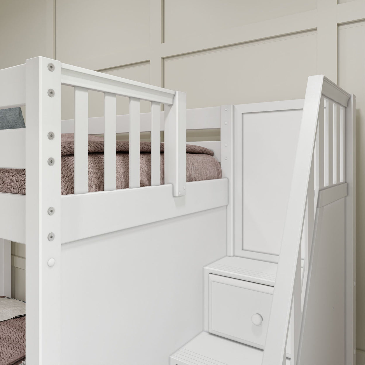 White wooden bunk bed with safety rails and built-in staircase drawers for storage in a modern bedroom.